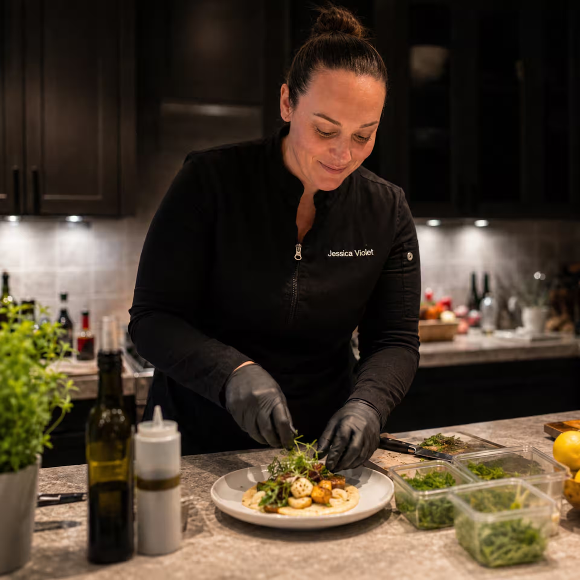 Chef Jessica Violet plating a dish in her Airbnb profile portrait
