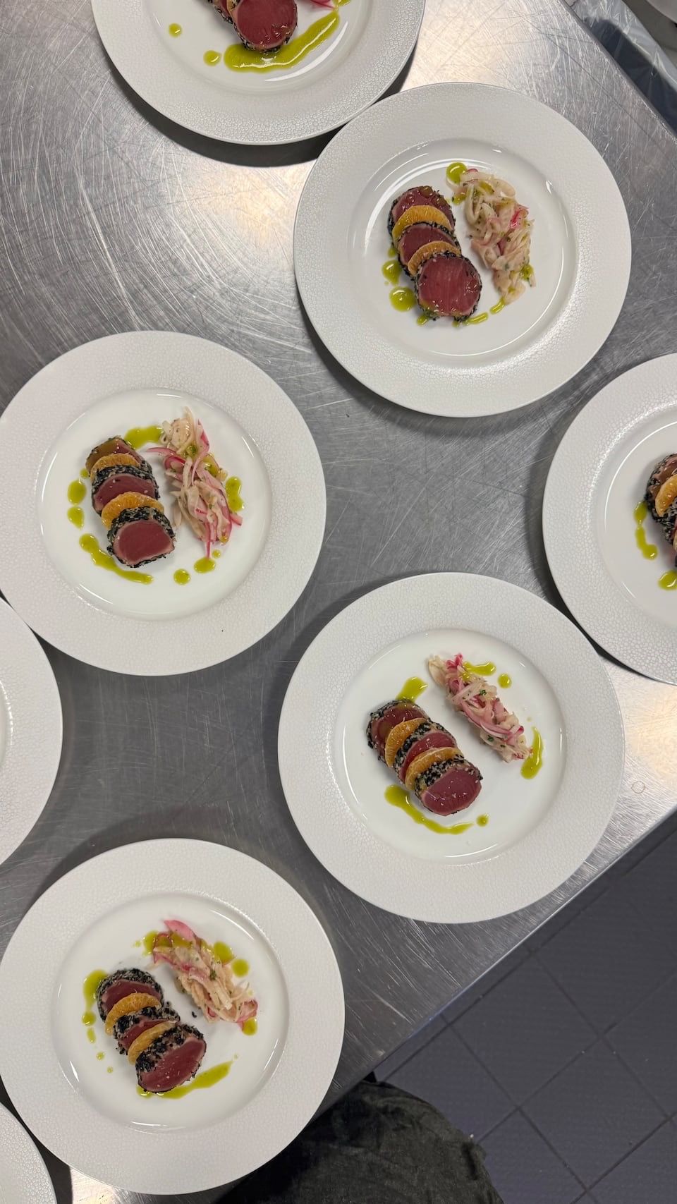 A series of plated tuna courses prepared by Chef Jessica Violet