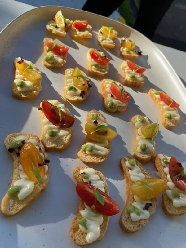 A generous seasonal sharing table prepared by Chef Jessica Violet